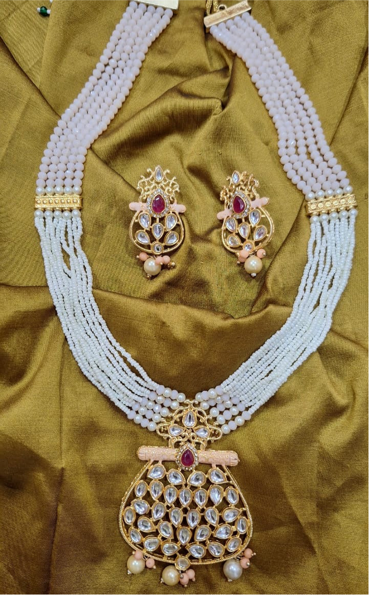 Gold Plated Pearl Necklace Set featuring matching earrings